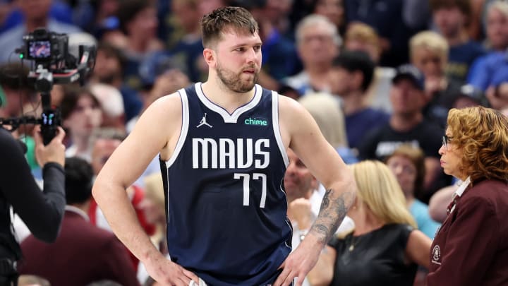 Dallas Mavericks guard Luka Doncic (77) reacts after fouling out of the game against the Boston Celtics during the fourth quarter during game three of the 2024 NBA Finals at American Airlines Center. Mandatory Credit: