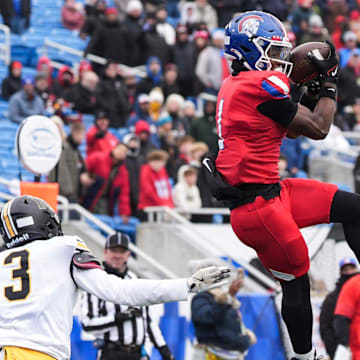 Christian Academy of Louisville's JaHyde Brown (1) makes a touchdown catch as the Centurions were up 28-0 over Murray at the KHSAA class 3A football state final at Kroger Field in Lexington Saturday, December 6, 2025.