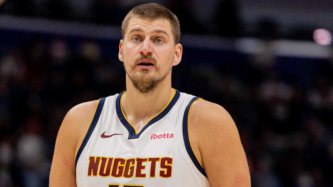 Nov 19, 2025; New Orleans, Louisiana, USA;  Denver Nuggets center Nikola Jokić (15) looks on against the New Orleans Pelicans during the first half  at Smoothie King Center. Mandatory Credit: Stephen Lew-Imagn Images
