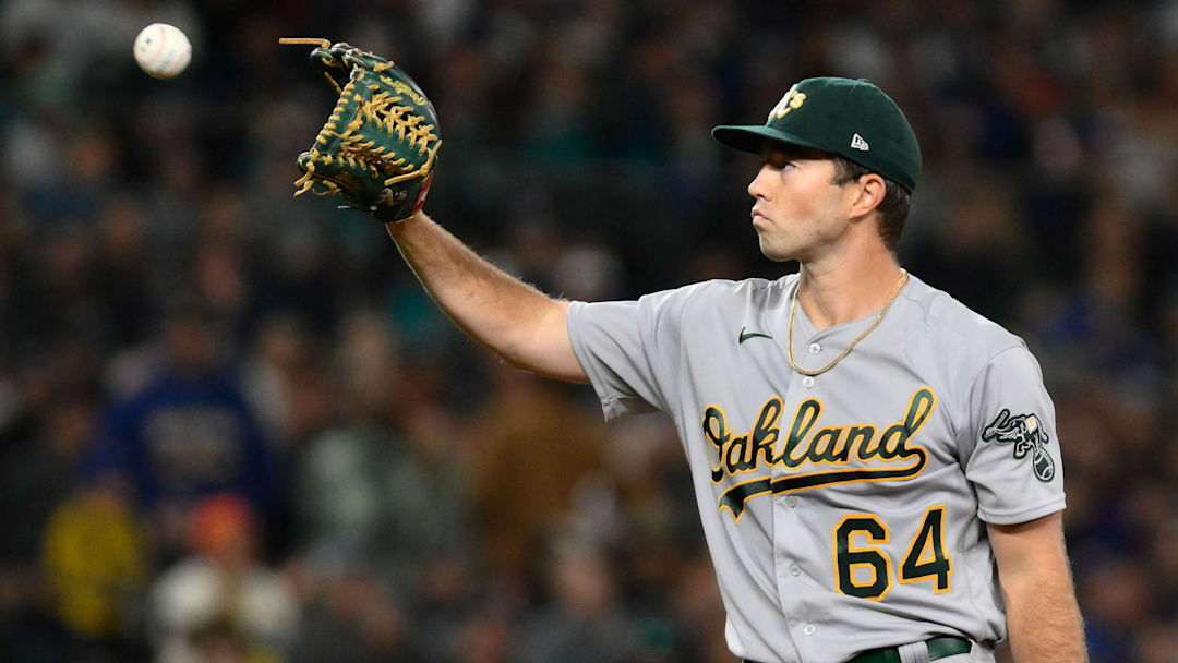 Aug 29, 2023; Seattle, Washington, USA; Oakland Athletics starting pitcher Ken Waldichuk (64) during the fourth inning against the Seattle Mariners at T-Mobile Park. Mandatory Credit: Steven Bisig-Imagn Images