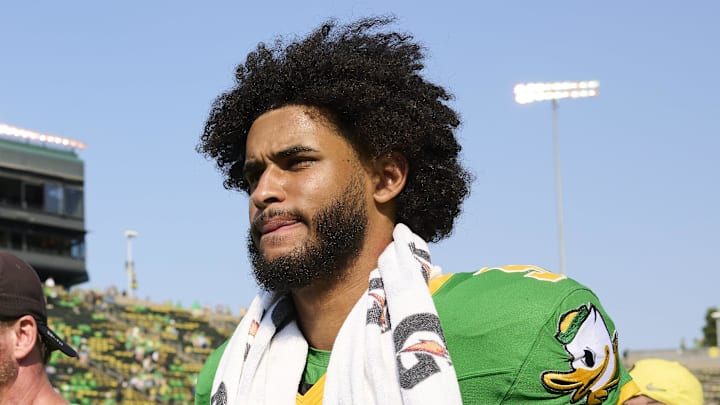 Sep 6, 2025; Eugene, Oregon, USA; Oregon Ducks quarterback Dante Moore (5) walks off the field after a game against the Oklahoma State Cowboys at Autzen Stadium. Mandatory Credit: Troy Wayrynen-Imagn Images Sep 6, 2025; Eugene, Oregon, USA; Oregon Ducks quarterback Dante Moore (5) walks off the field after a game against the Oklahoma State Cowboys at Autzen Stadium. Mandatory Credit: Troy Wayrynen-Imagn Images