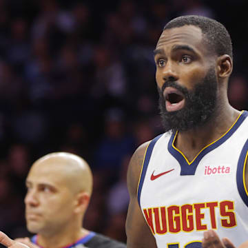 Oct 27, 2025; Minneapolis, Minnesota, USA; Denver Nuggets guard Tim Hardaway Jr. (10) questions a referee on a call against him and for the Minnesota Timberwolves in the fourth quarter at Target Center. Mandatory Credit: Bruce Kluckhohn-Imagn Images