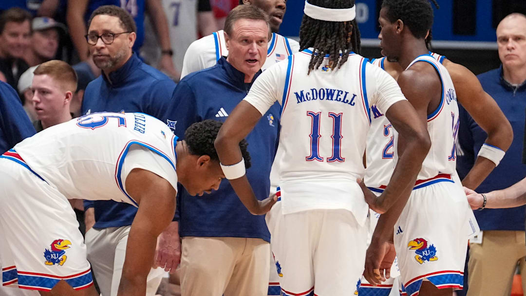 Feb 21, 2026; Lawrence, Kansas, USA; Kansas Jayhawks head coach Bill Self talks with players during a timeout against the Cincinnati Bearcats during the first half of the game at Allen Fieldhouse. Mandatory Credit: Denny Medley-Imagn Images