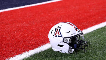 Sep 2, 2023; Tucson, Arizona, USA; Arizona Wildcats quarterback Jayden de Laura (7) helmet on the field after a victory over Northern Arizona Lumberjacks at Arizona Stadium. Mandatory Credit: Zac BonDurant-USA TODAY Sports