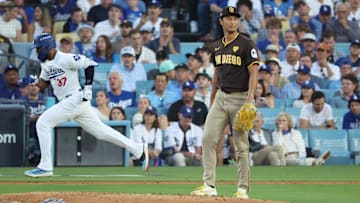 Padres pitcher Yu Darvish (11) reacts in the fourth inning against the Los Angeles Dodgers during game two of the NLDS for the 2024 MLB Playoffs at Dodger Stadium. 