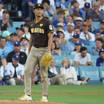 Padres pitcher Yu Darvish (11) reacts in the fourth inning against the Los Angeles Dodgers during game two of the NLDS for the 2024 MLB Playoffs at Dodger Stadium. 