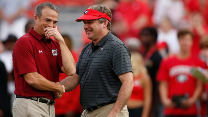 Georgia Bulldogs coach Kirby Smart (right) and South Carolina Gamecocks head coach Shane Beamer (left)