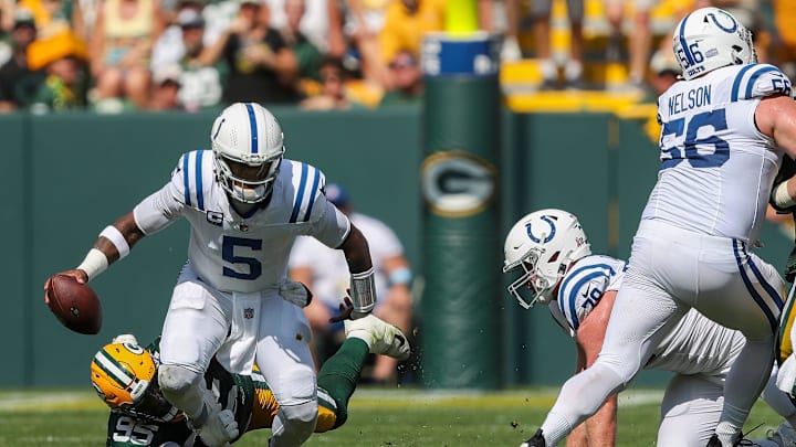 Green Bay Packers defensive tackle Devonte Wyatt (95) sacks Indianapolis Colts quarterback Anthony Richardson (5) on Sunday, September 15, 2024, at Lambeau Field in Green Bay, Wis. The Packers won the game, 16-10.
Tork Mason/USA TODAY NETWORK-Wisconsin