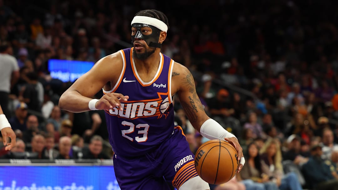 Mar 22, 2026; Phoenix, Arizona, USA; Phoenix Suns guard Jordan Goodwin (23) dribbles down court against the Toronto Raptors during the third quarter at Mortgage Matchup Center. Mandatory Credit: Anna Carrington-Imagn Images