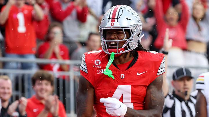 Oct 10, 2026; Columbus, Ohio, USA;  Ohio State Buckeyes wide receiver Jeremiah Smith (4) celebrates his touchdown during the first quarter against the Maryland Terrapins at Ohio Stadium.  Mandatory Credit: Joseph Maiorana-Imagn Images