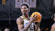 Mar 9, 2025; Wichita, Kansas, USA; Wichita State Shockers center Quincy Ballard (15) reacts after a play during the second half against the Tulsa Golden Hurricane at Charles Koch Arena. Mandatory Credit: William Purnell-Imagn Images