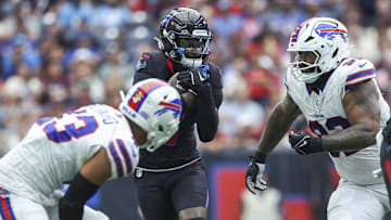Oct 6, 2024; Houston, Texas, USA; Houston Texans wide receiver Stefon Diggs (1) runs with the ball after a reception during the second quarter against the Buffalo Bills at NRG Stadium. Mandatory Credit: Troy Taormina-Imagn Images