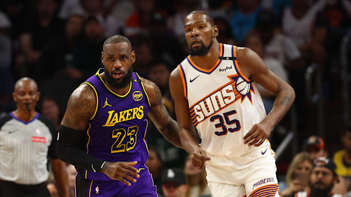Oct 28, 2024; Phoenix, Arizona, USA; Los Angeles Lakers forward LeBron James (23) against Phoenix Suns forward Kevin Durant (35) at Footprint Center. Mandatory Credit: Mark J. Rebilas-Imagn Images Oct 28, 2024; Phoenix, Arizona, USA; Los Angeles Lakers forward LeBron James (23) against Phoenix Suns forward Kevin Durant (35) at Footprint Center. Mandatory Credit: Mark J. Rebilas-Imagn Images