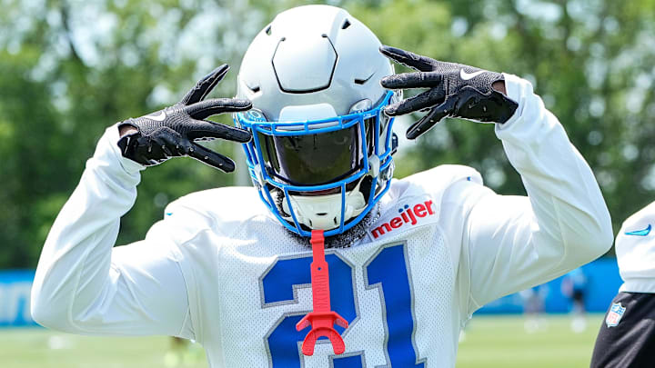 Detroit Lions cornerback Amik Robertson (21) poses for a photo next to cornerback Rock Ya-Sin (23) after practice during OTA at Meijer Performance Center in Allen Park on Friday, May 30, 2025.