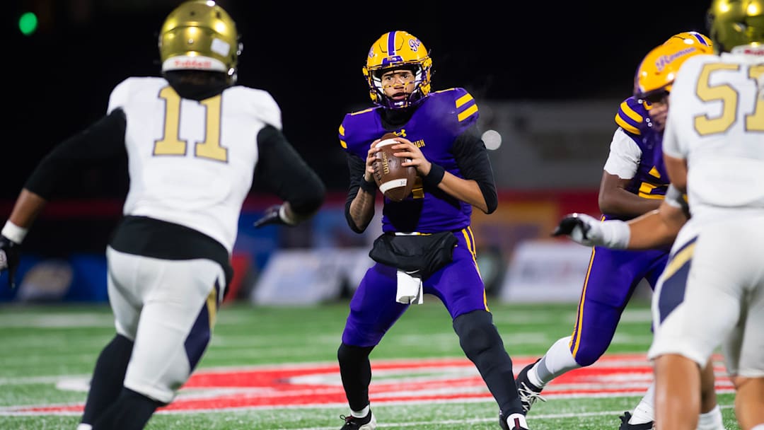 Roman Catholic's Semaj Beals looks to pass from the pocket during the PIAA Class 5A football championship game against Bishop McDevitt at Cumberland Valley High School, Friday, Dec. 5, 2025, in Mechanicsburg, Pa.