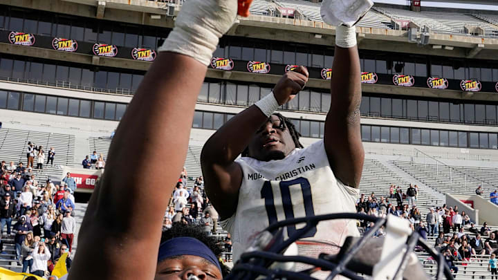 Mobile Christian's Floyd Boucard (10) celebrates during the final moments of the 3A AHSAA State Championship Game in Bryant-Denny Stadium Thursday, Dec. 7, 2023, in Tuscaloosa. Mobile Christian defeated Madison Academy 55-28.