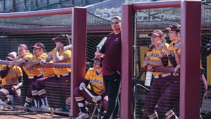 Gophers softball coach Piper Ritter with her team.