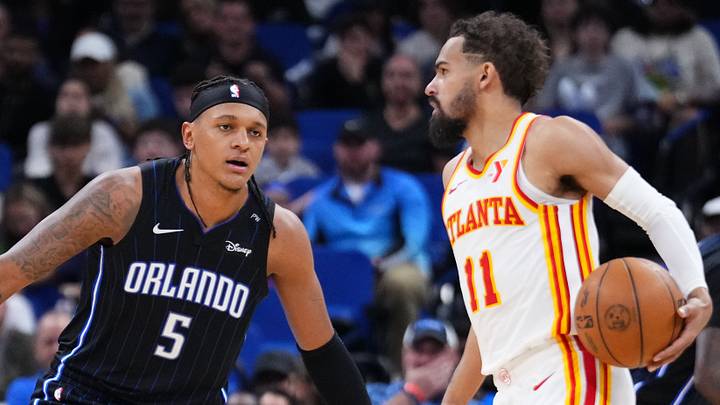 Trae Young #11 of the Atlanta Hawks dribbles against the Orlando Magic.