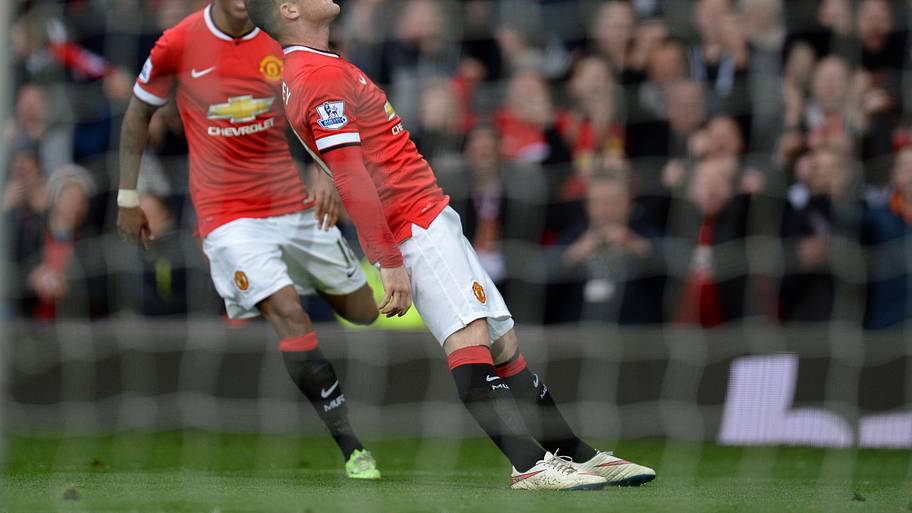 Wayne Rooney celebrating scoring for Manchester United.