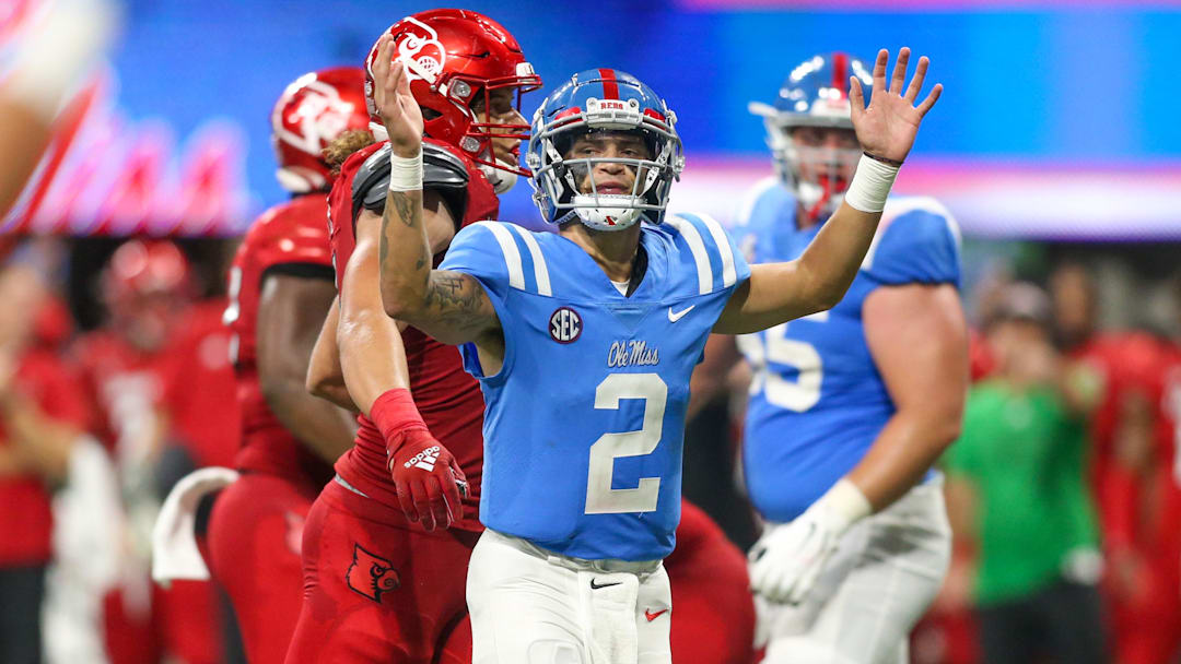 Sep 6, 2021; Atlanta, Georgia, USA; Mississippi Rebels quarterback Matt Corral (2) shows emotion against the Louisville Cardinals in the second half at Mercedes-Benz Stadium. Mandatory Credit: Brett Davis-Imagn Images