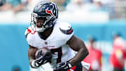 Sep 21, 2025; Jacksonville, Florida, USA; Houston Texans cornerback Myles Bryant (27) runs with the ball during the second quarter against the Jacksonville Jaguars at EverBank Stadium. Mandatory Credit: Morgan Tencza-Imagn Images