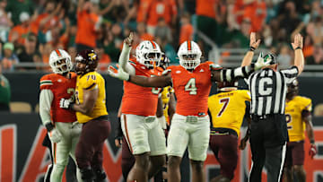 Sep 6, 2025; Miami Gardens, Florida, USA; Miami Hurricanes defensive lineman Rueben Bain Jr. (4) reacts after a sack against the Bethune-Cookman Wildcats during the third quarter at Hard Rock Stadium. Mandatory Credit: Sam Navarro-Imagn Images