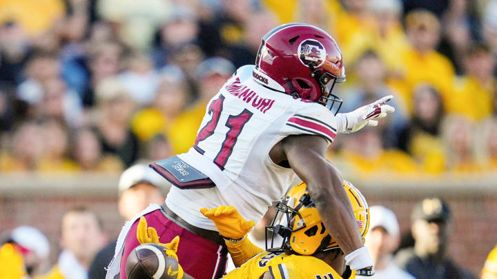 Oct 21, 2023; Columbia, Missouri, USA; Missouri Tigers wide receiver Luther Burden III (3) is unable to make the catch against South Carolina Gamecocks defensive back Nick Emmanwori (21) and defensive back DQ Smith (1) during the second half at Faurot Field at Memorial Stadium. Mandatory Credit: Jay Biggerstaff-USA TODAY Sports