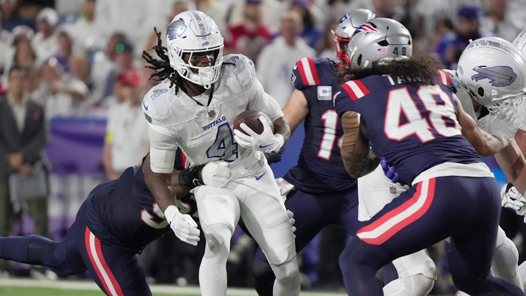 Buffalo Bills running back James Cook carries the ball during firsts half action at Highmark Stadium in Orchard Park on Oct. 5, 2025.