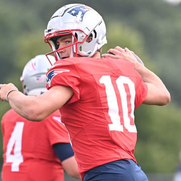 Aug 03, 2024; Foxborough, MA, USA; New England Patriots quarterback Drake Maye (10) throws a pass during training camp at Gillette Stadium.