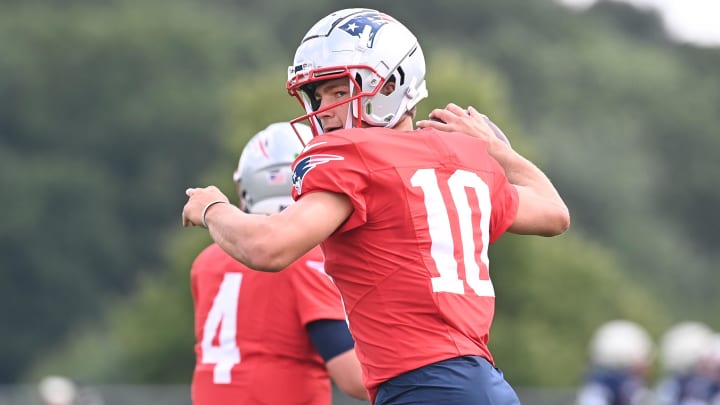 Aug 03, 2024; Foxborough, MA, USA; New England Patriots quarterback Drake Maye (10) throws a pass during training camp at Gillette Stadium.