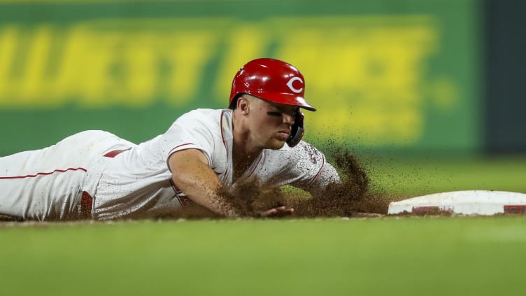 Cincinnati Reds third baseman Brandon Drury (22) slides into third base.