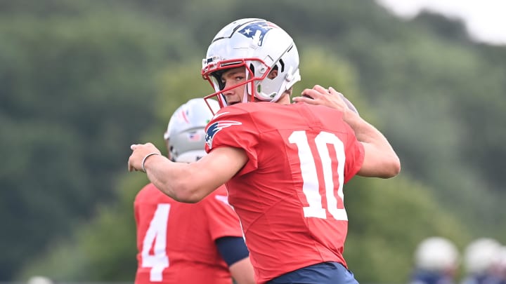 Aug 03, 2024; Foxborough, MA, USA; New England Patriots quarterback Drake Maye (10) throws a pass during training camp at Gillette Stadium. Mandatory Credit: Eric Canha-USA TODAY Sports