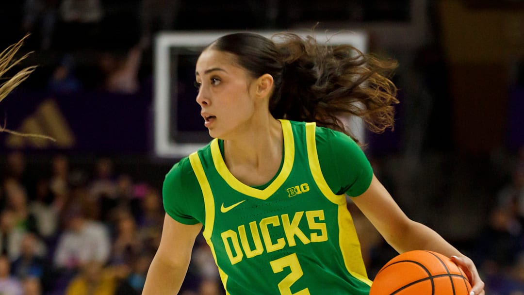 Oregon guard Katie Fiso drives toward the basket as the Oregon Ducks face the Washington Huskies on Feb. 15, 2026, at Alaska Airlines Arena in Seattle, Washington.