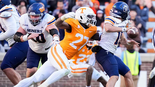 Tennessee defensive lineman James Pearce Jr. sacks UTEP quarterback JP Pickles during a game.