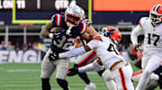 Oct 26, 2025; Foxborough, Massachusetts, USA;  Cleveland Browns linebacker Mohamoud Diabate (43) tackesl New England Patriots running back Treveyon Henderson (32) during the fourth quarter at Gillette Stadium. Mandatory Credit: Bob DeChiara-Imagn Images