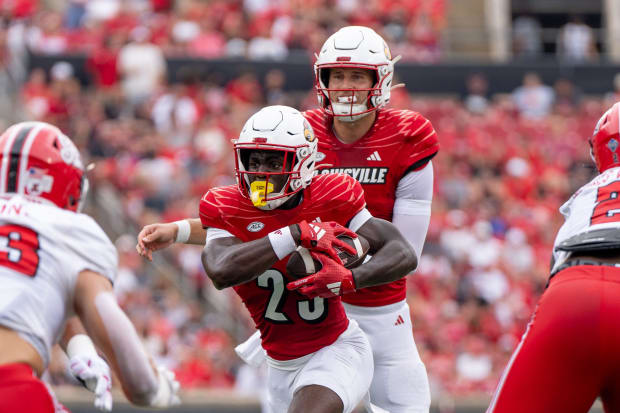 Louisville Cardinals running back Isaac Brown (25) runs the ball 