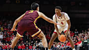 Mar 9, 2025; Piscataway, New Jersey, USA; Rutgers Scarlet Knights guard Ace Bailey (4) is defended by Minnesota Golden Gophers forward Dawson Garcia (3) during the second half at Jersey Mike's Arena. Mandatory Credit: Vincent Carchietta-Imagn Images