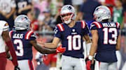 Aug 8, 2025; Foxborough, Massachusetts, USA; New England Patriots quarterback Drake Maye (10) celebrates after scoring a touchdown during the first half against the Washington Commanders at Gillette Stadium. Mandatory Credit: Paul Rutherford-Imagn Images