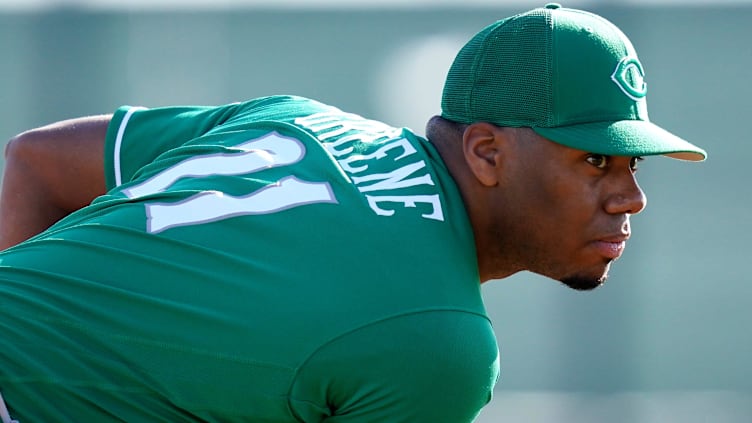 Cincinnati Reds pitcher Hunter Greene (21) delivers during a live batting practice session.