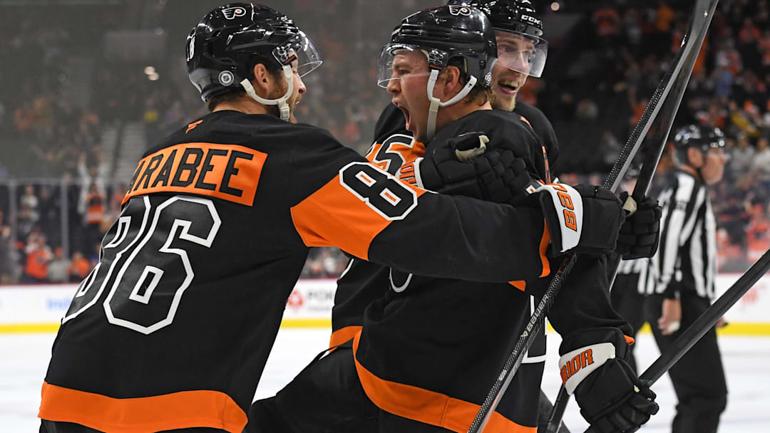 Oct 31, 2024; Philadelphia, Pennsylvania, USA; Philadelphia Flyers right wing Bobby Brink (10) celebrates his goal with left wing Joel Farabee (86) and defenseman Rasmus Ristolainen (55) against the St. Louis Blues during the third period at Wells Fargo Center. Mandatory Credit: Eric Hartline-Imagn Images