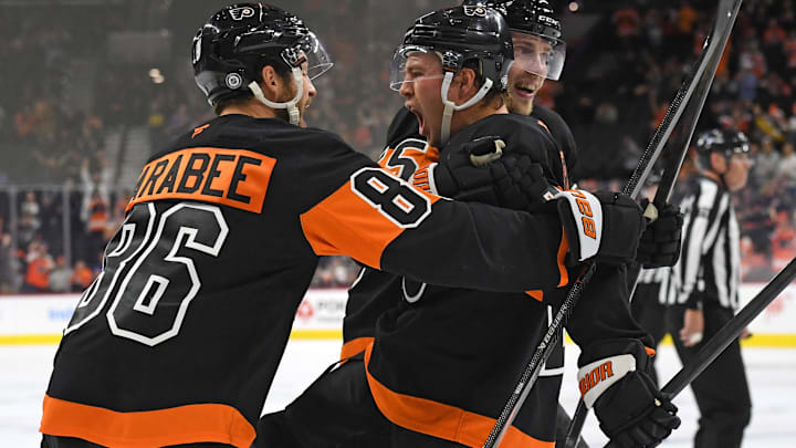 Oct 31, 2024; Philadelphia, Pennsylvania, USA; Philadelphia Flyers right wing Bobby Brink (10) celebrates his goal with left wing Joel Farabee (86) and defenseman Rasmus Ristolainen (55) against the St. Louis Blues during the third period at Wells Fargo Center. Mandatory Credit: Eric Hartline-Imagn Images
