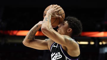 Oct 10, 2025; Portland, Oregon, USA;  Sacramento Kings guard Nique Clifford (5) shoots the ball against Portland Trail Blazers in the second half at Moda Center. Mandatory Credit: Jaime Valdez-Imagn Images