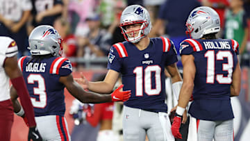 Aug 8, 2025; Foxborough, Massachusetts, USA; New England Patriots quarterback Drake Maye (10) celebrates after scoring a touchdown during the first half against the Washington Commanders at Gillette Stadium. Mandatory Credit: Paul Rutherford-Imagn Images