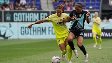 Washington Spirit forward Trinity Rodman (2) battles NJ/NY Gotham FC midfielder Yazmeen Ryan (18) for the ball in the first half at Red Bull Arena