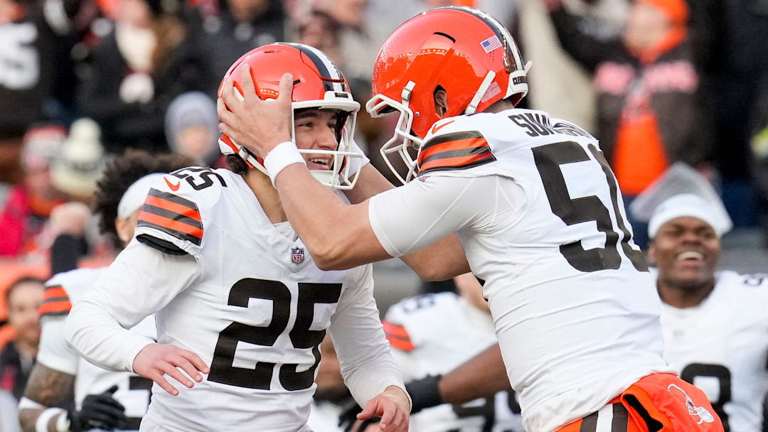 Cleveland Browns place kicker Andre Szmyt (25) and long snapper Rex Sunahara (50) celebrate after kicking the game-winning field goal as time expires in the fourth quarter of the NFL Week 18 game between the Cincinnati Bengals and the Cleveland Browns at Paycor Stadium in Downtown Cincinnati on Sunday, Jan. 4, 2026. The Browns kicked a last second field goal to win 20-18.