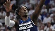 May 24, 2025; Minneapolis, Minnesota, USA; Minnesota Timberwolves forward Leonard Miller (33) shoots the ball against the Oklahoma City Thunder during the second half in game three of the western conference finals for the 2025 NBA Playoffs at Target Center. Mandatory Credit: Bruce Kluckhohn-Imagn Images