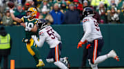 Green Bay Packers quarterback Jordan Love (10) passes the ball under pressure from Chicago Bears defensive end Jacob Martin (55) on Sunday, January 5, 2025, at Lambeau Field in Green Bay, Wis. 

Tork Mason/USA TODAY NETWORK-Wisconsin