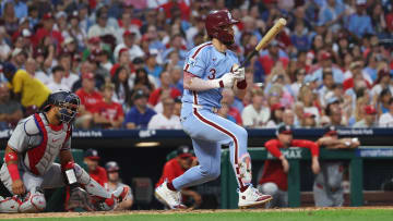 Aug 15, 2024; Philadelphia, Pennsylvania, USA; Philadelphia Phillies first base Bryce Harper (3) hits an RBI single during the fourth inning against the Washington Nationals at Citizens Bank Park.