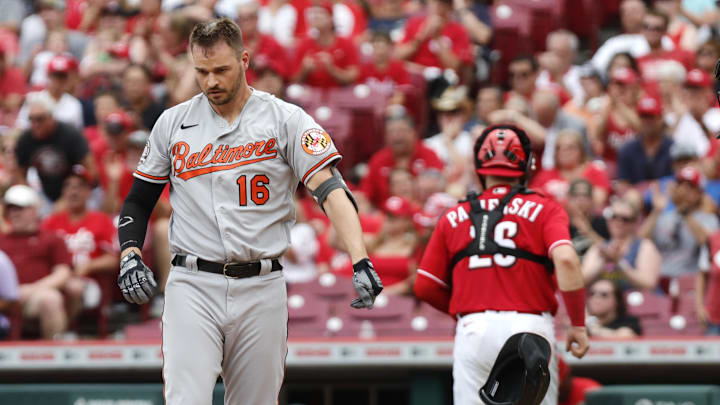 Jul 31, 2022; Cincinnati, Ohio, USA; Baltimore Orioles right fielder Trey Mancini (16) reacts after striking out against the Cincinnati Reds during the seventh inning at Great American Ball Park. 