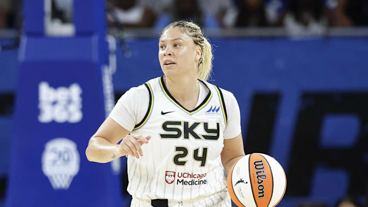 Jul 24, 2025; Chicago, Illinois, USA; Chicago Sky guard Rachel Banham (24) brings the ball up court against the Seattle Storm during the first half at Wintrust Arena. Mandatory Credit: Kamil Krzaczynski-Imagn Images